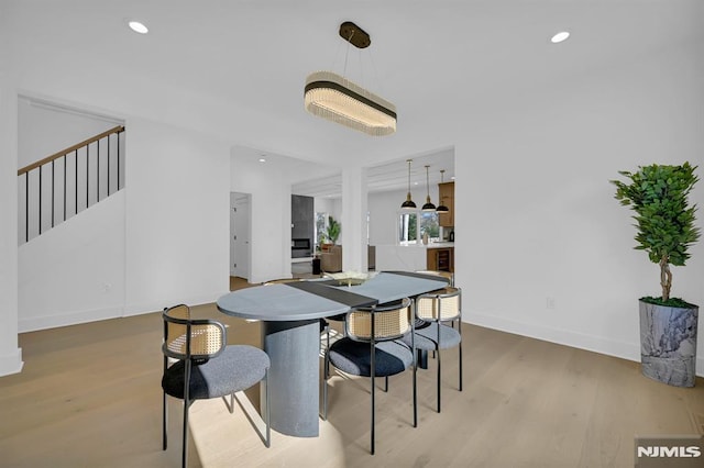 dining room with hardwood / wood-style floors