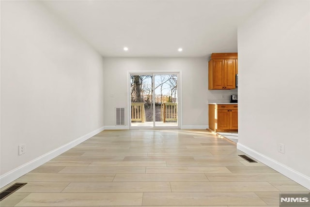 interior space with light hardwood / wood-style flooring