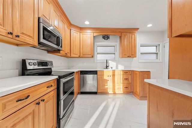 kitchen with stainless steel appliances and sink