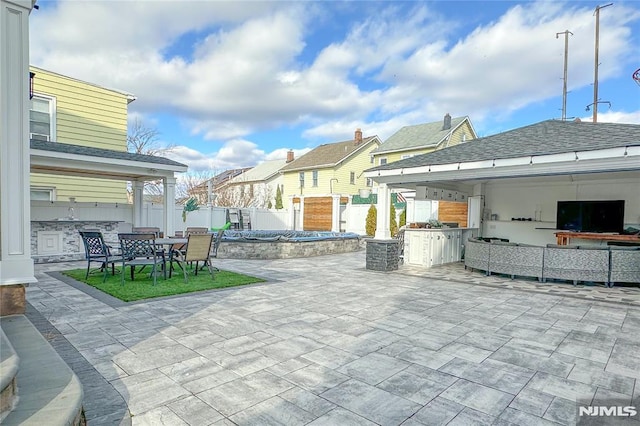 view of patio featuring an outdoor kitchen