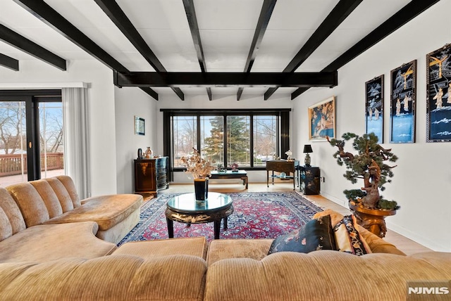 living room featuring beam ceiling