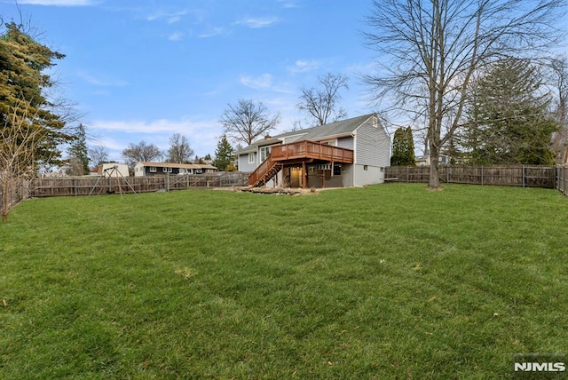 view of yard with a deck