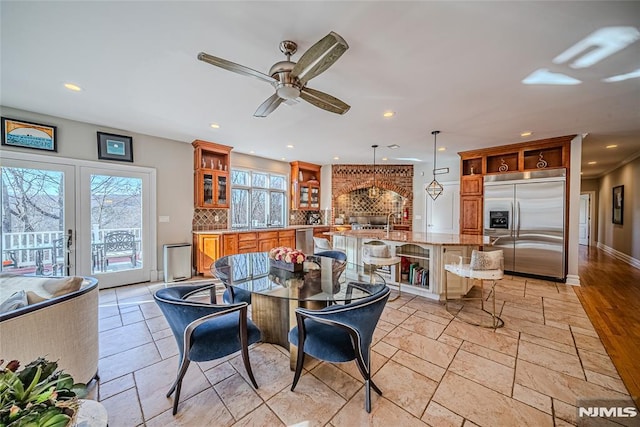 dining area with ceiling fan