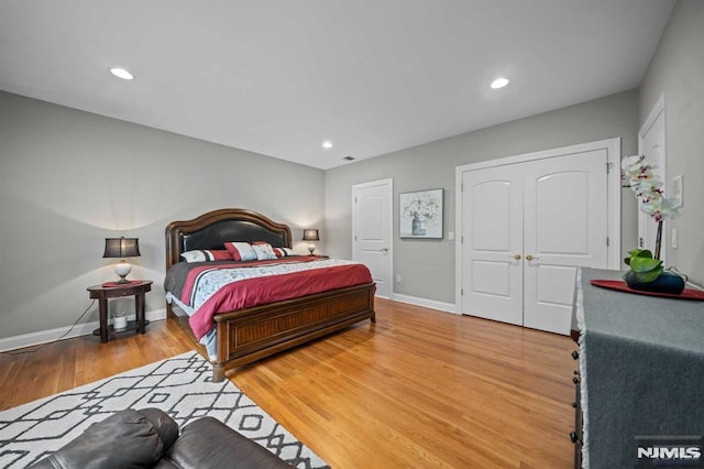 bedroom with hardwood / wood-style floors