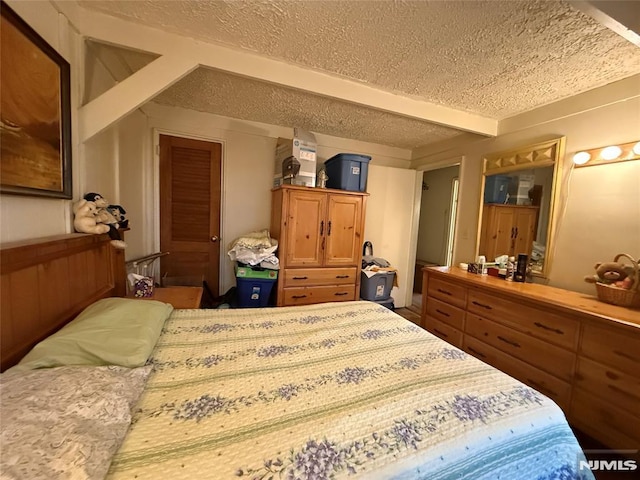 bedroom with a textured ceiling