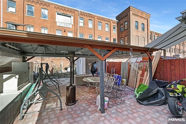 view of patio with ceiling fan