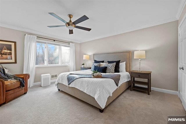 bedroom featuring ceiling fan, light carpet, and ornamental molding