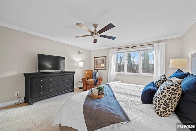 bedroom with light carpet, ceiling fan, and crown molding