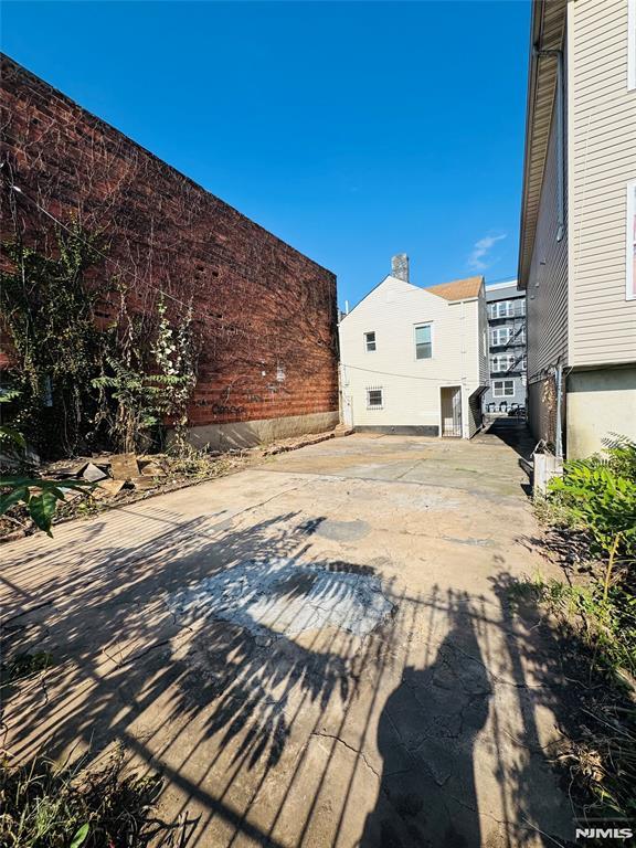 view of patio / terrace featuring a garage