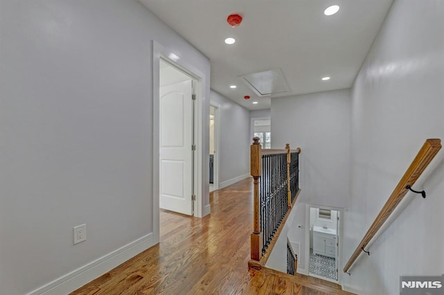 hall featuring hardwood / wood-style flooring