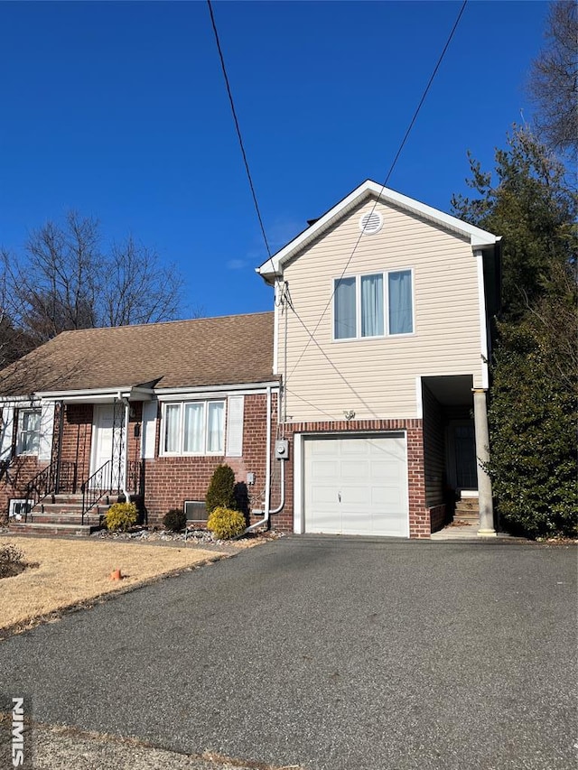 view of front of home with a garage