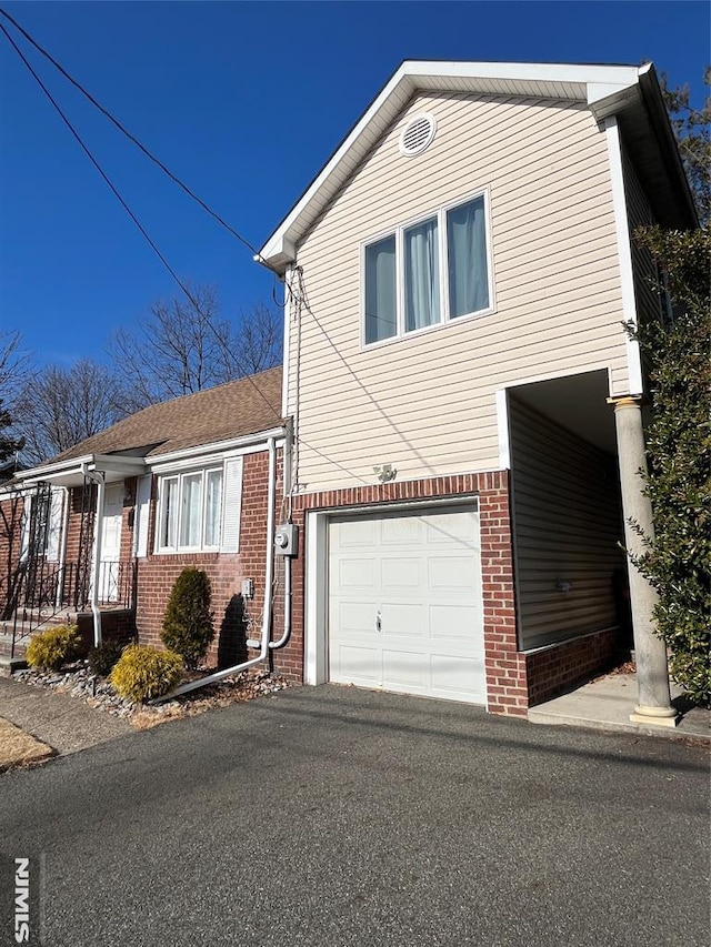 view of front of home featuring a garage