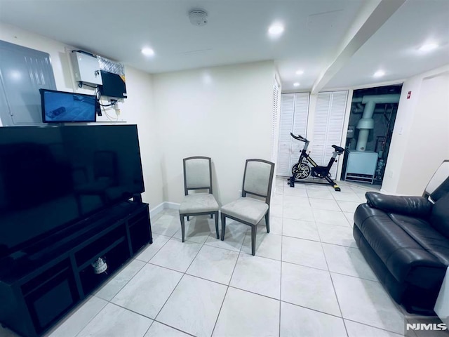 living area featuring light tile patterned flooring