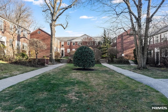 view of community with a lawn