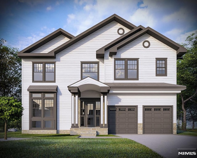 view of front of property featuring driveway, a front lawn, an attached garage, and stone siding