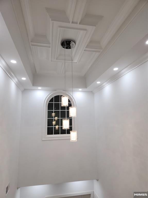 interior details featuring ornamental molding, coffered ceiling, and recessed lighting