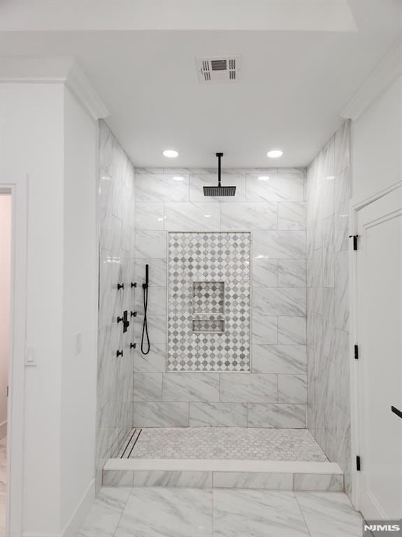 full bathroom with recessed lighting, marble finish floor, visible vents, and walk in shower