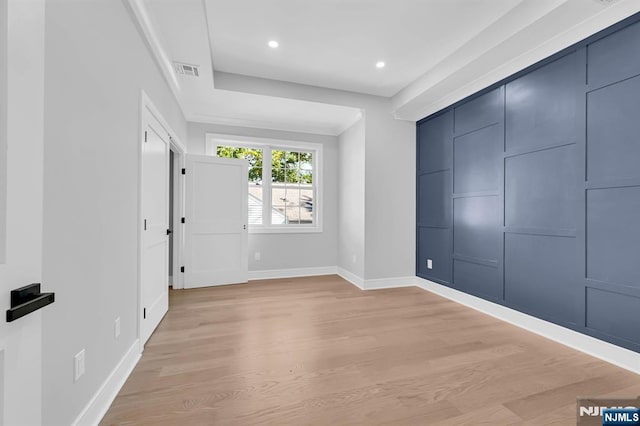 interior space with visible vents, recessed lighting, light wood-style flooring, and baseboards