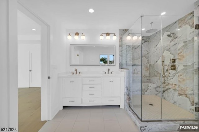 bathroom with vanity and walk in shower