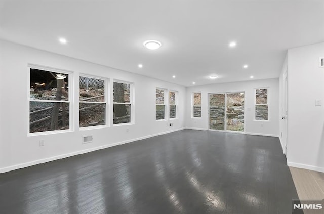 unfurnished living room featuring a fireplace