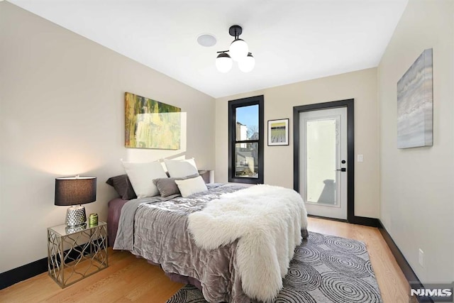 bedroom with light hardwood / wood-style floors