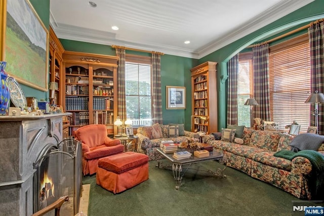 living area featuring ornamental molding, carpet floors, and recessed lighting