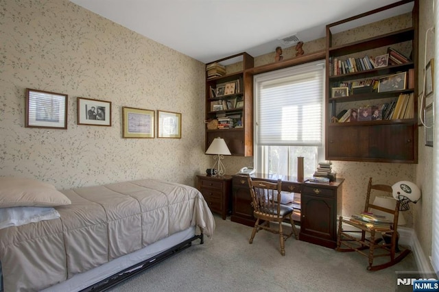 carpeted bedroom with visible vents