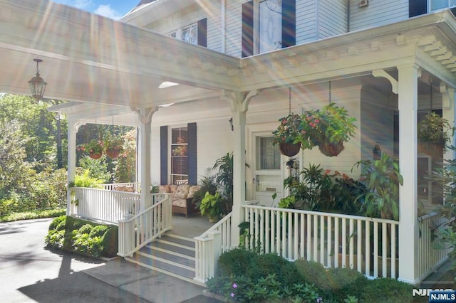 doorway to property with a porch