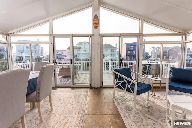 sunroom with vaulted ceiling