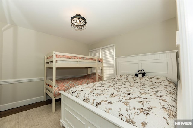 bedroom featuring wood-type flooring