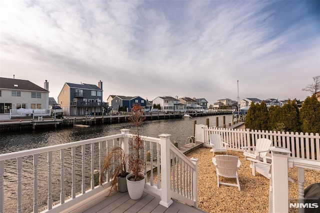 deck featuring a water view