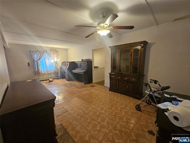 living room with ceiling fan and parquet flooring