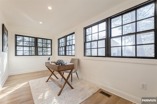 home office featuring light hardwood / wood-style flooring