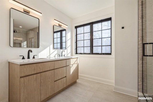 bathroom with vanity and walk in shower