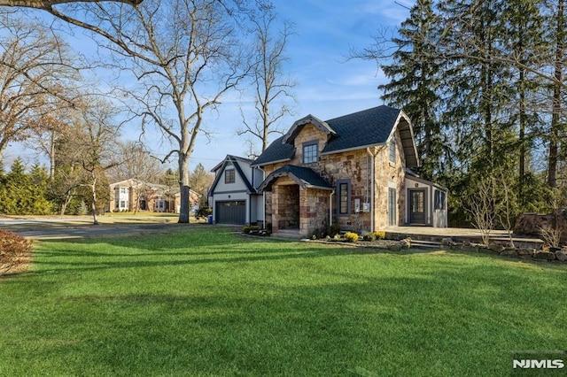 view of front of property with a front lawn