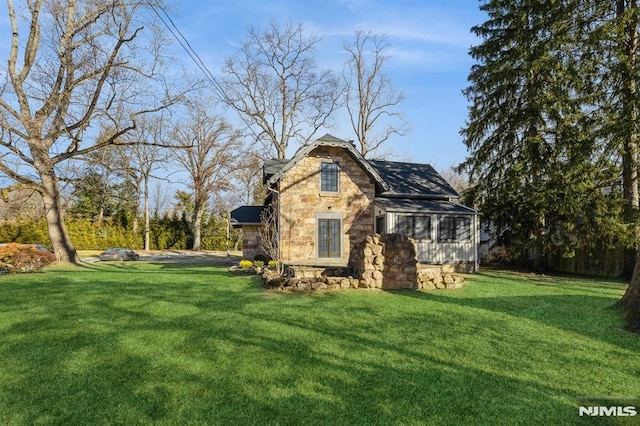 exterior space with a front lawn