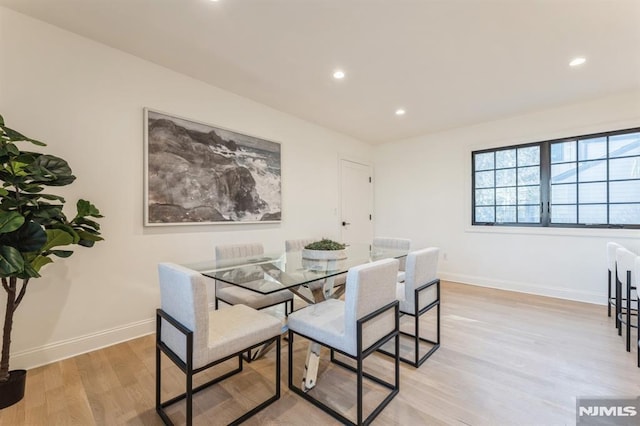 dining area featuring light hardwood / wood-style flooring