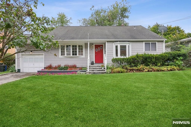 single story home with a front lawn and a garage