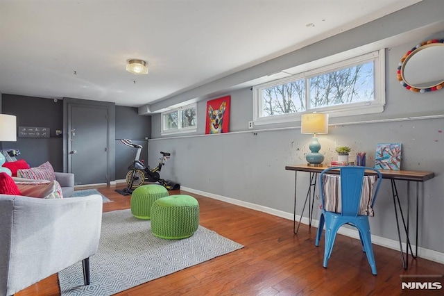 rec room with hardwood / wood-style flooring