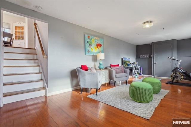 sitting room with hardwood / wood-style floors