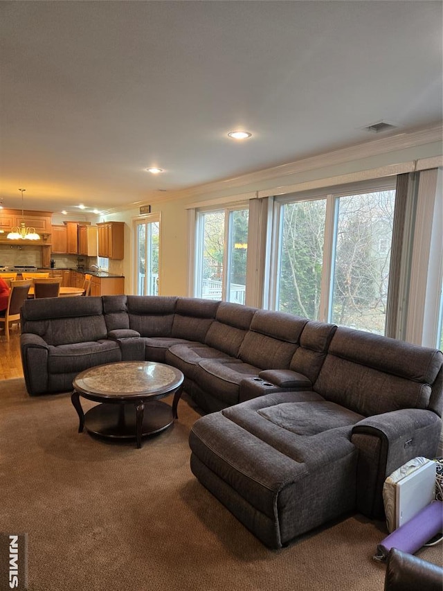 living room with ornamental molding