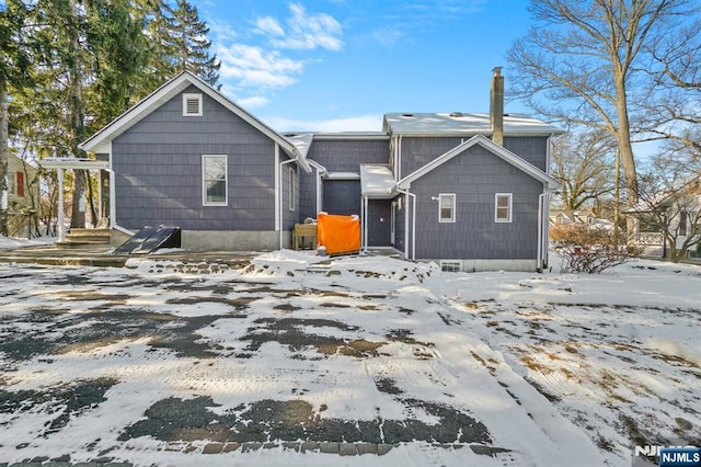 view of snow covered property