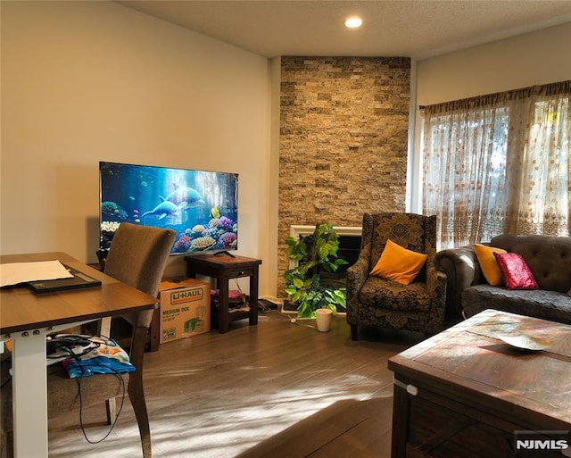 office area with hardwood / wood-style floors