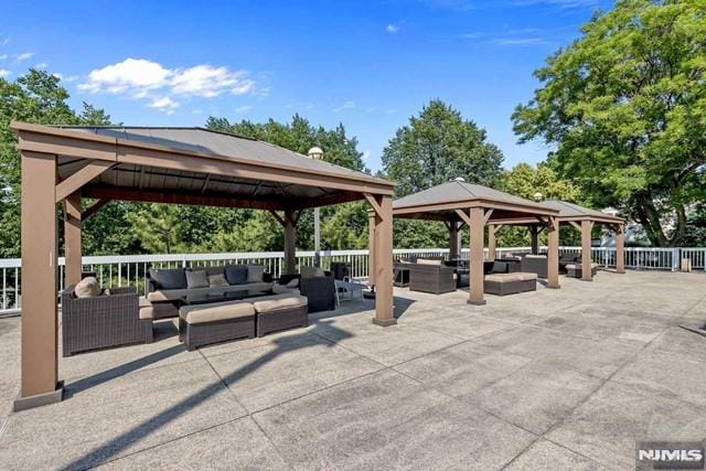 surrounding community with a gazebo, an outdoor hangout area, and a patio