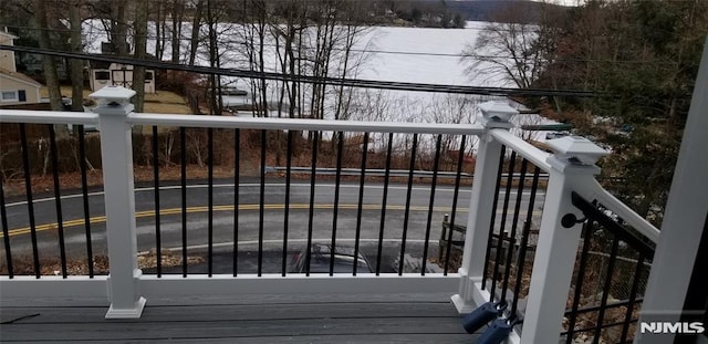 view of snow covered gate