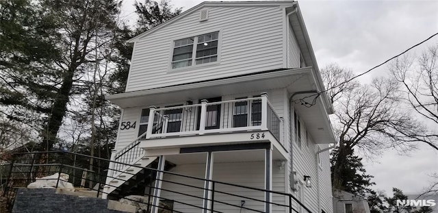 view of property featuring a balcony