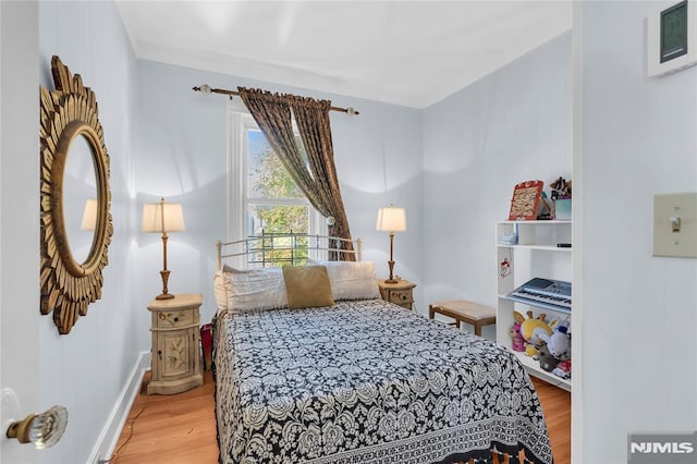 bedroom featuring light hardwood / wood-style floors