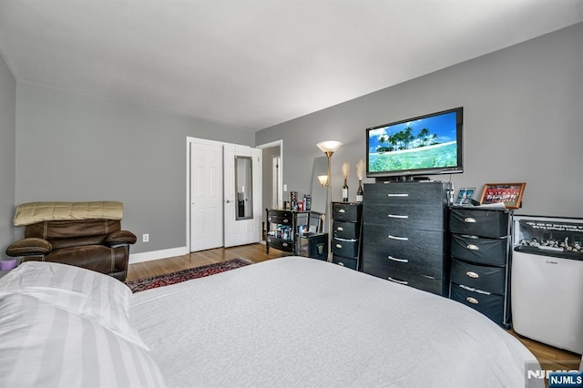 bedroom featuring dark hardwood / wood-style floors