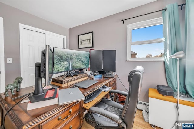 home office featuring light wood-type flooring