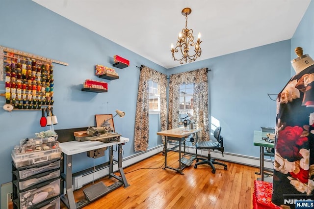 office area featuring a chandelier and hardwood / wood-style floors